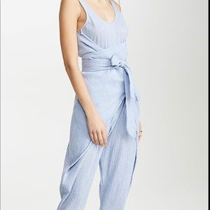 Adorable Hatch Romper! Baby blue color, easy wrap.